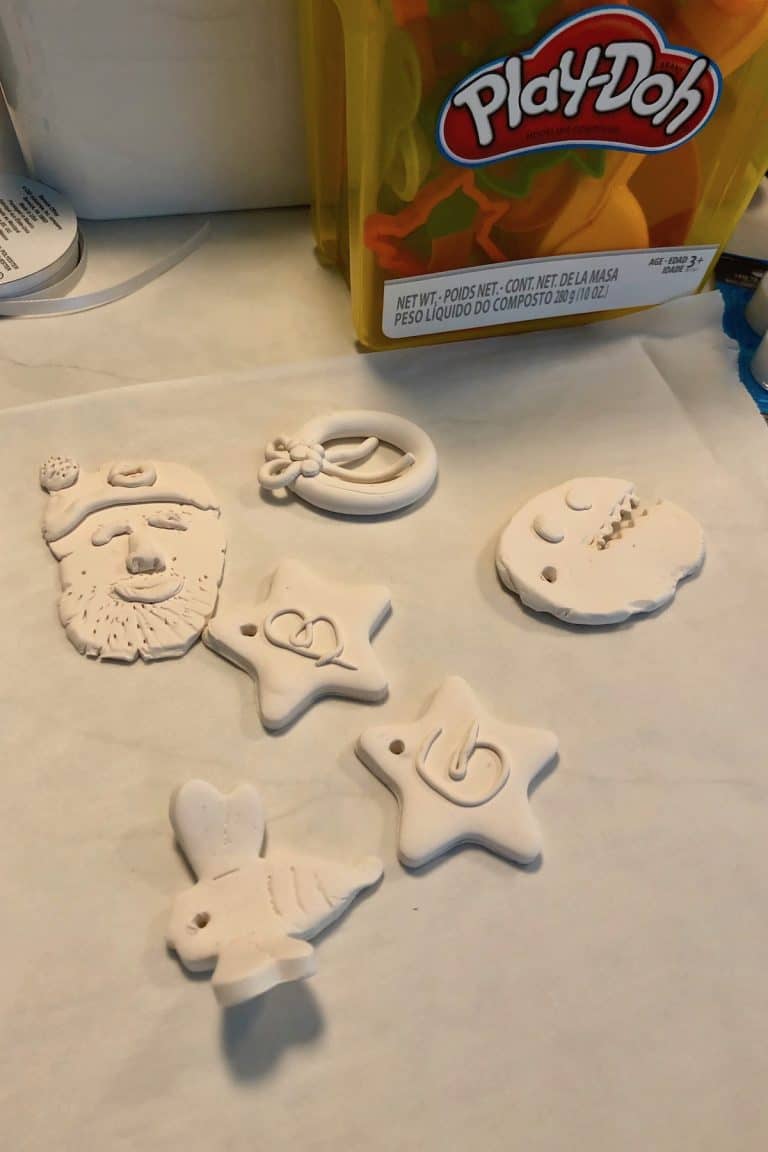 Making clay christmas ornaments with playdough tools