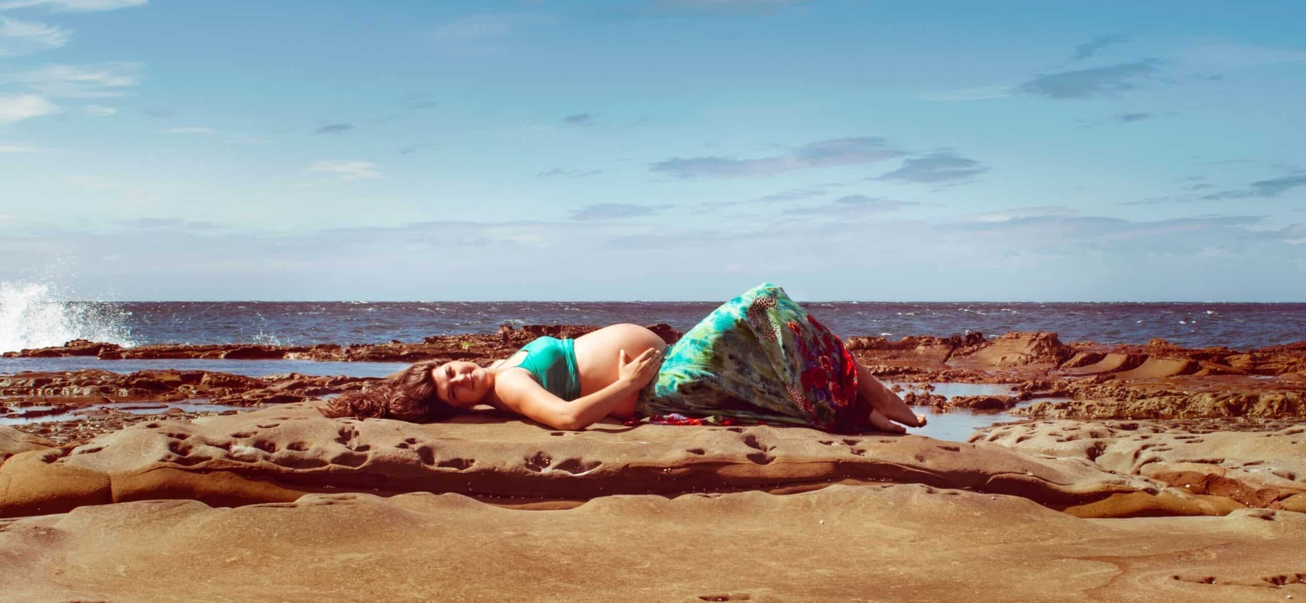 beach maternity photos - lying down