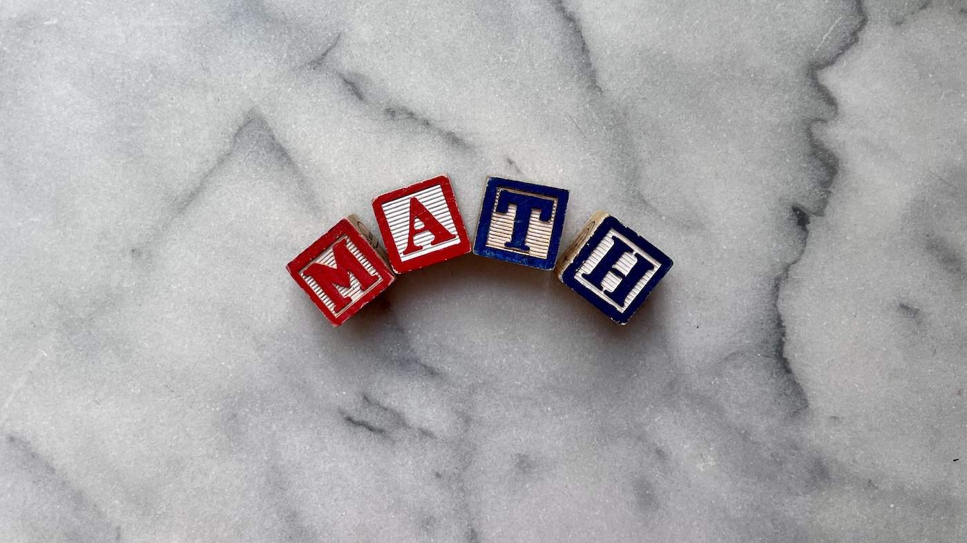 Math in wooden kids letter blocks