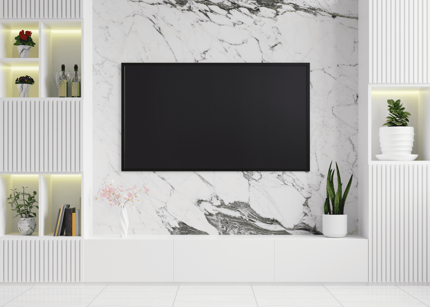 Black tv mounted on a marble wall.