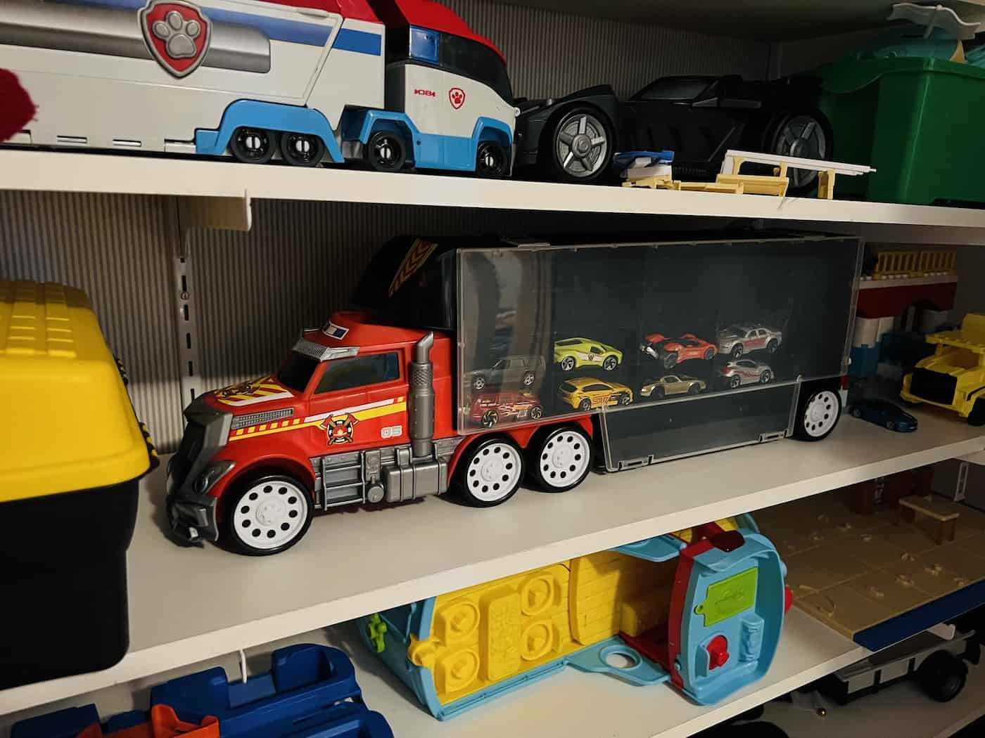 toy cars in carrier truck